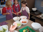 school children preparing food